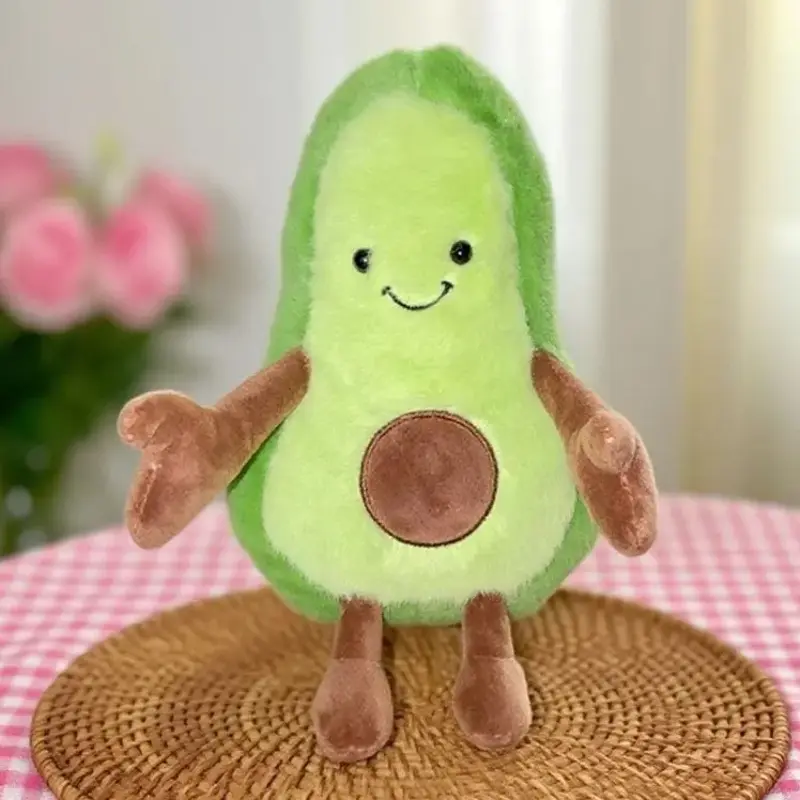 Peluche avocat kawaii douce verte, style Jellycat, bras ouverts.
