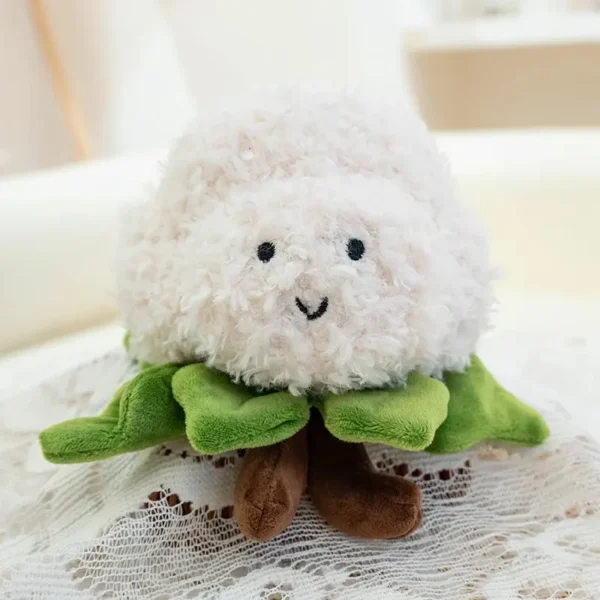 Peluche chou-fleur Jellycat kawaii, blanche et verte, visage souriant brodé.