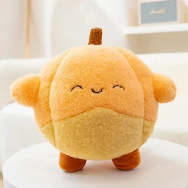 Peluche citrouille Jellycat orange et jaune pâle, design kawaii original, 18cm.