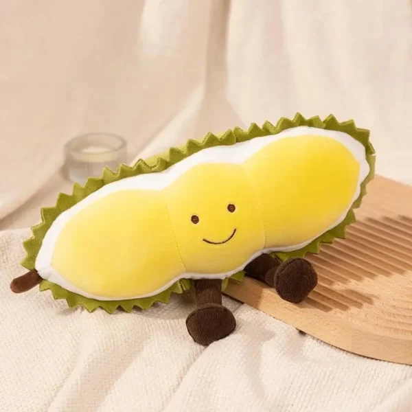 Peluche Durian jaune et verte, style Jellycat, douce, visage kawaii.