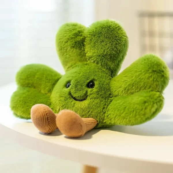 Peluche trèfle verte porte-bonheur 15cm, style Jellycat, visage kawaii, jambes côtelées.